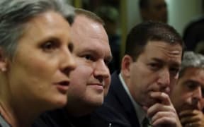 Laila Harre, Kim Dotcom and journalist Glenn Greenwald speak to reporters after the Moment of Truth event.