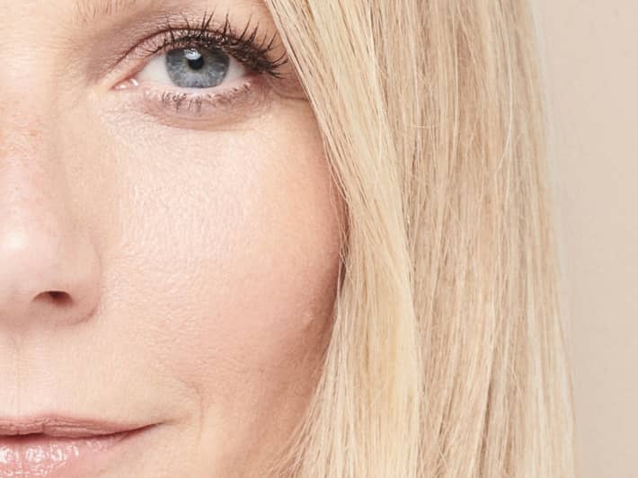 A close-up of an attractive blonde womnan's face.