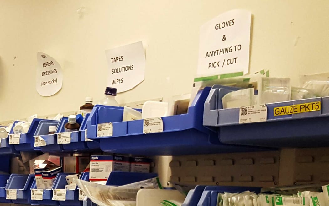 Blue racks with medical supplies