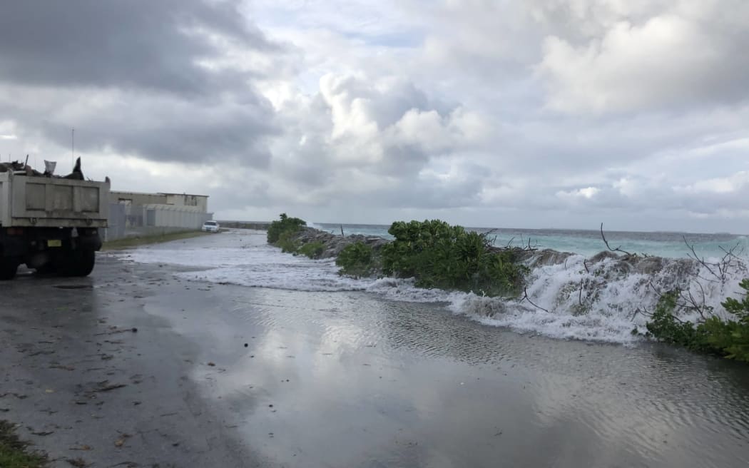 Waves break over Majuro's sea wall at high tide, 27-11-19.