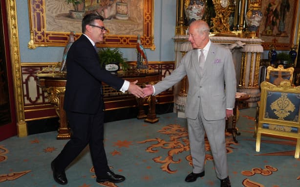 King Charles Britain's King Charles III shakes hands with Britain's incoming Prime Minister Andy Burnham, during an audience at Buckingham Palace, London, where he invited the leader of the Labour Party to become Prime Minister and form a new government, on July 20, 2026.