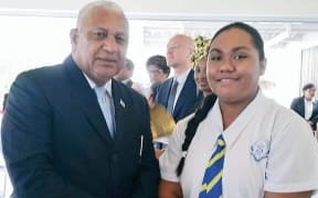 AnnMary Raduva with Prime Minister Frank Bainimarama.