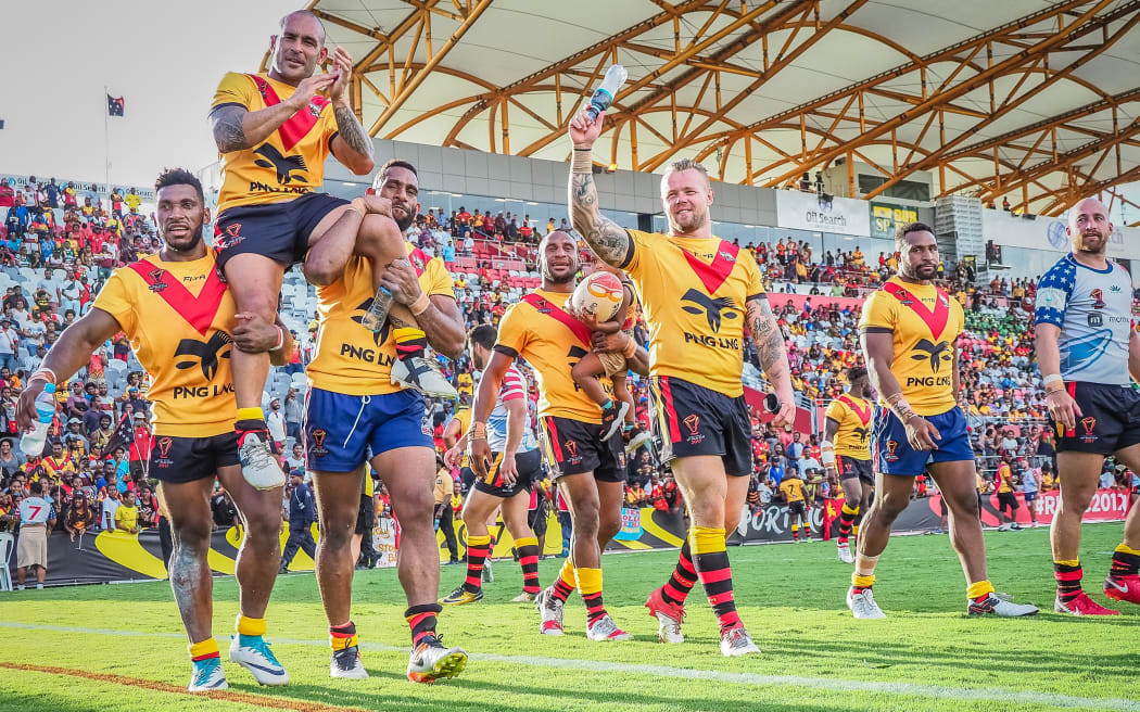 PNG players thank the crowd after sealing a third successive home win.