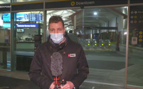 Checkpoint reporter Nick Truebridge at Auckland's downtown ferry terminal on the night a new Level 4 lockdown was announced.