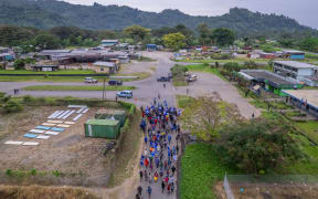 Bougainvilleans marching during the Independence day celebrations earlier this month. President Toroama says the Infrastructure Agreement is a "momentous step" for the government to "building a prosperous future for Bougainville through substantial advancements in critical infrastructure development".