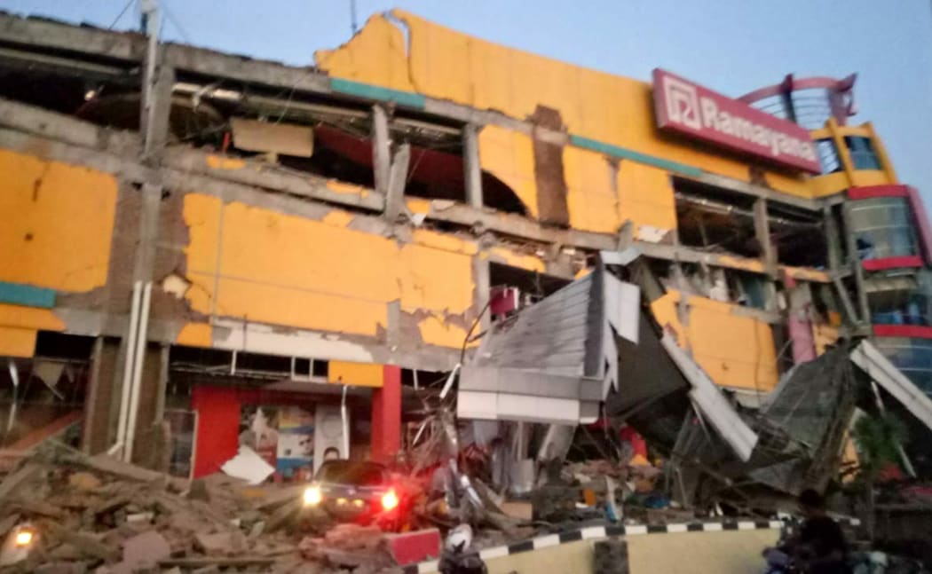 A collapsed shopping mall in Palu, Central Sulawesi after a 7.5 magnitude earthquake hit the area.