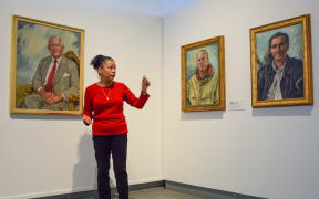 Curator Maria Brown hosting a virtual tour of the exhibition 'A Good Idea' at the New Zealand Portrait Gallery.
