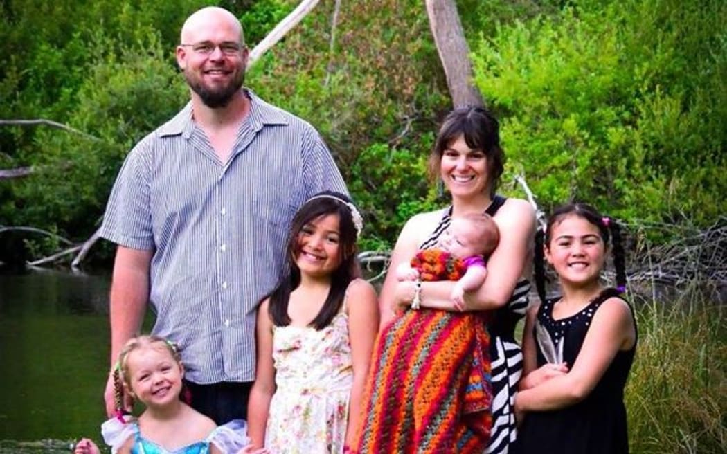 A family photo with (from left) Isis, Robin, Tia-Bella, Tara holding Cordelia and Majenta.