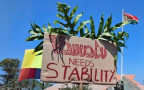 Caption: Civil society march outside the Vanuatu Parliament, November 2023 (Anna Naupa (adapted)