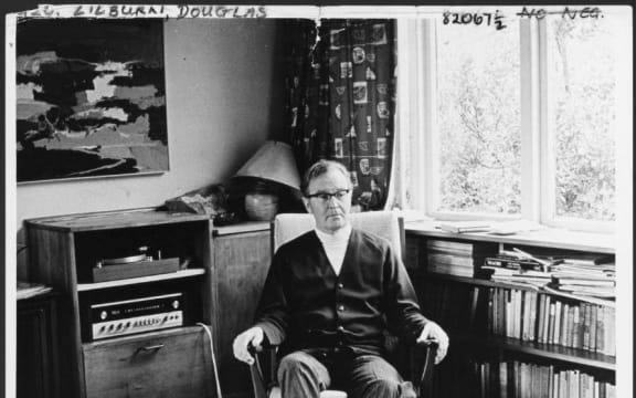 Douglas Lilburn in the sitting room of his home at 22 Ascot Terrace, Thorndon, Wellington, circa 1970.