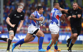 Tusi Pisi and Census Johnston playing for Samoa against the All Blacks in 2015.