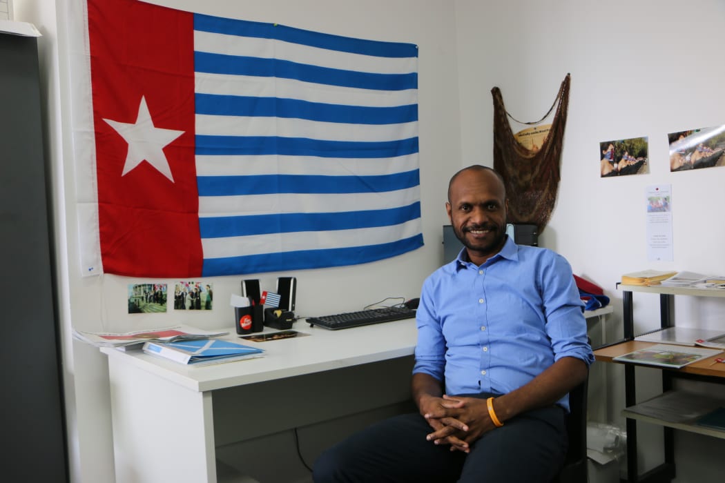 Wensislaus Fatubun sits at the West Papua Solidarity Desk, Auckland NZ.
