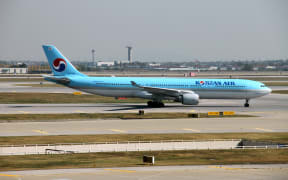 A jet plane of Korean Air is pictured at the Incheon International Airport in Incheon, South Korea, 6 May 2018.