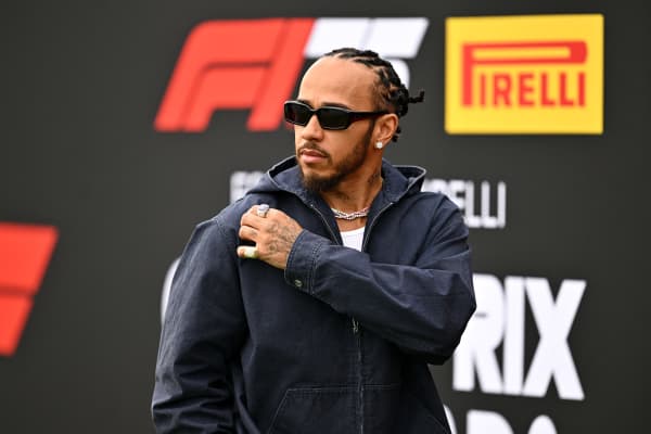Lewis Hamilton arrives in the Paddock during previews ahead of the F1 Grand Prix in Canada.
