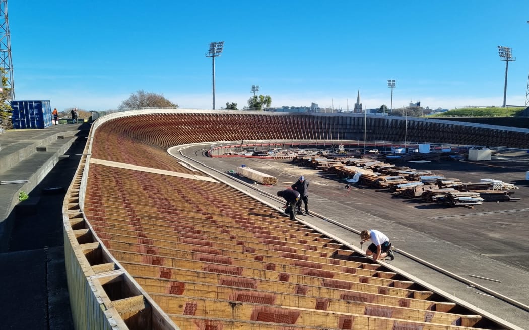 The new track is being hand nailed with about 300,000 nails. Laid end to end the new accoya timber would stretch 75km.