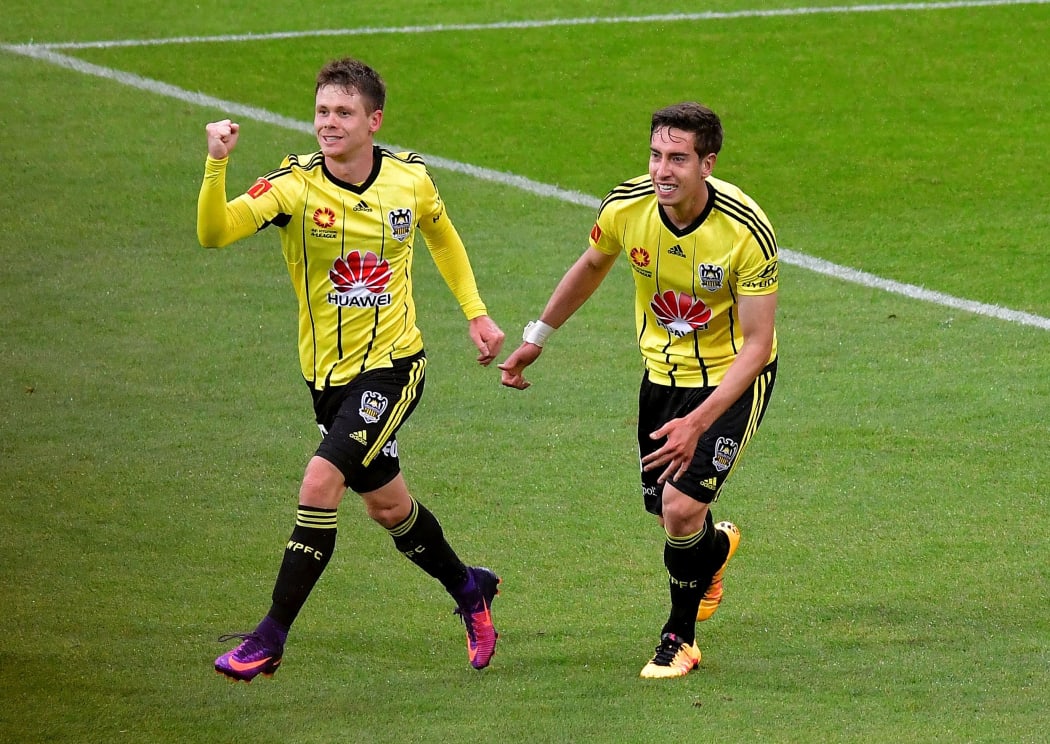Phoenix's Michael McGlinchey (L) celebrates scoring a goal with team mate Alex Rodriguez.
 during the A-League - Phoenix v Central Coast Mariners football match at Westpac Stadium in Wellington on Saturday the 14 January 2017.