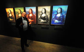 French engineer and founder of Lumiere Technology, Pascal Cotte explains how he looked through layers of accumulated varnish to see the original surface at an exhibition at The Museum of Science and Industry (MOSI) in Manchester on November 12, 2009.