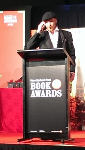 Jarrod Gilbert accepts his award.