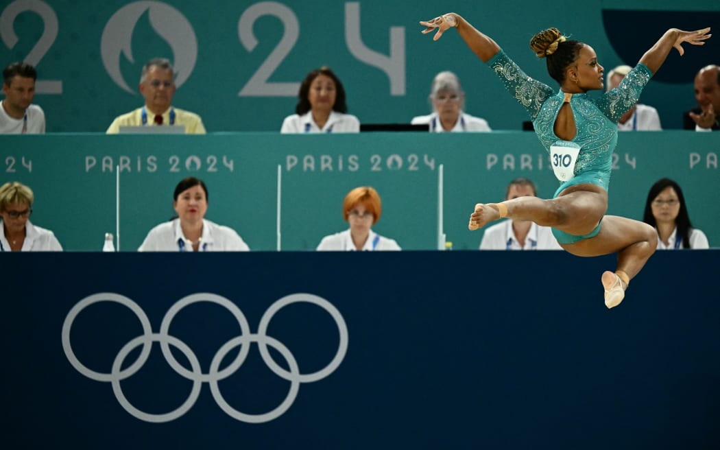 Brazil's Rebeca Andrade competes in the artistic gymnastics women's floor exercise final during the Paris 2024 Olympic Games at the Bercy Arena in Paris, on August 5, 2024. (Photo by Loic VENANCE / AFP)