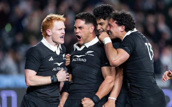 Quinn Tupaea celebrates.