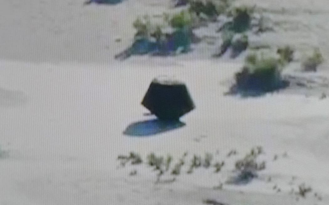 This shot off a NASA live feed of the Osiris-Rex asteroid sample's return craft sitting in the Utah desert at Dugway, Utah, on 24 September, 2023.