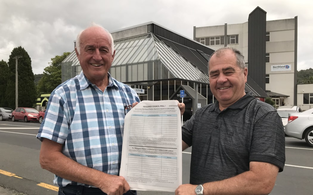 Māori ward polling lobbyists John Bain (left) and Robin Grieve in late 2020 outside NRC with the beginnings of their petition campaign.