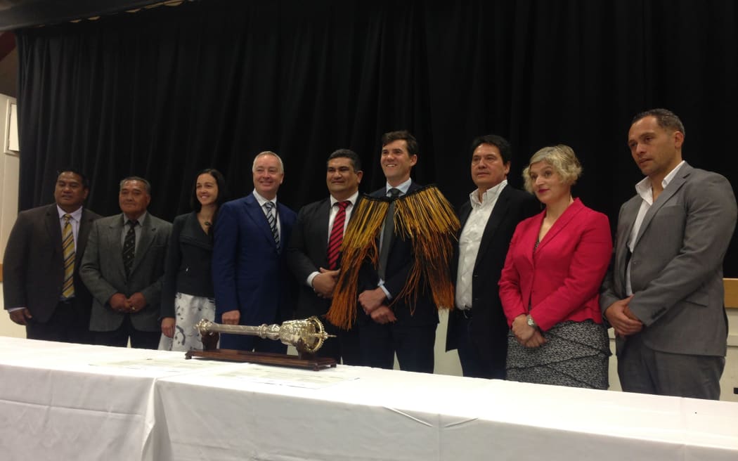 Taku Parai, left, Mathew Solomon, Jill Day, Kevin Lavery, Paul Eagle, Justin Lester, Wayne Mulligan, Hannah Buchanan, Jason Fox at the signing of the MoU.