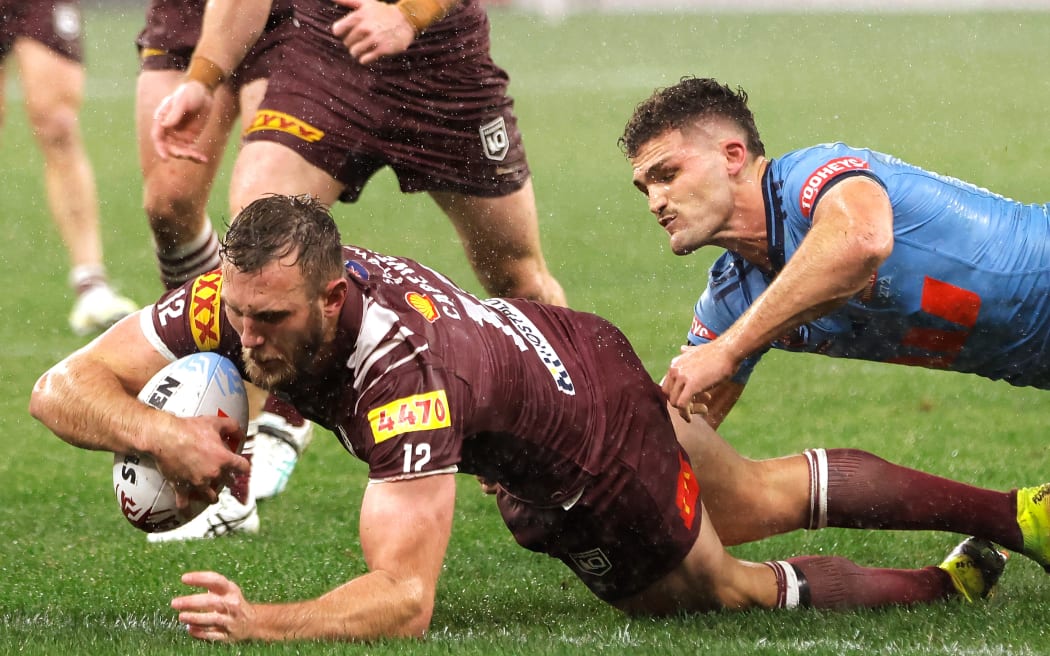 Kurt Capewell of the Maroons scores a try during the State of Origin game two in Perth, 2025.