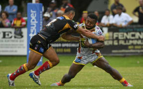 Jokadi Bire playing against the Sunshine Coast Falcons.