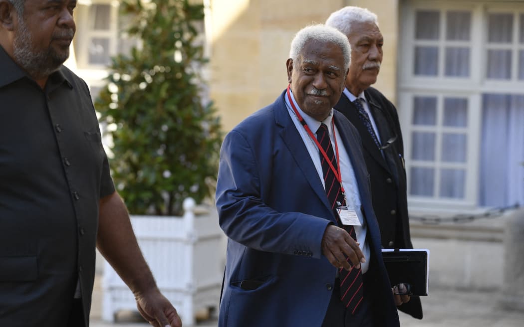 President of the New Caledonia Congress Rock Wamytan (c) arrives to attend a meeting with New Caledonian political leaders and members of the "nickel" working group in Paris on September 6.