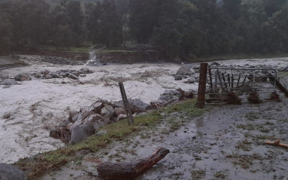 A flooded river in Te Puia Springs Valley, Gisborne region, 23 March 2022