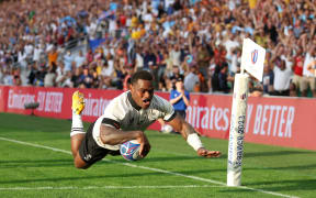 Josua Tuisova of Fiji scores his team's first try during the Rugby World Cup France 2023 match between Australia and Fiji at Stade Geoffroy-Guichard.