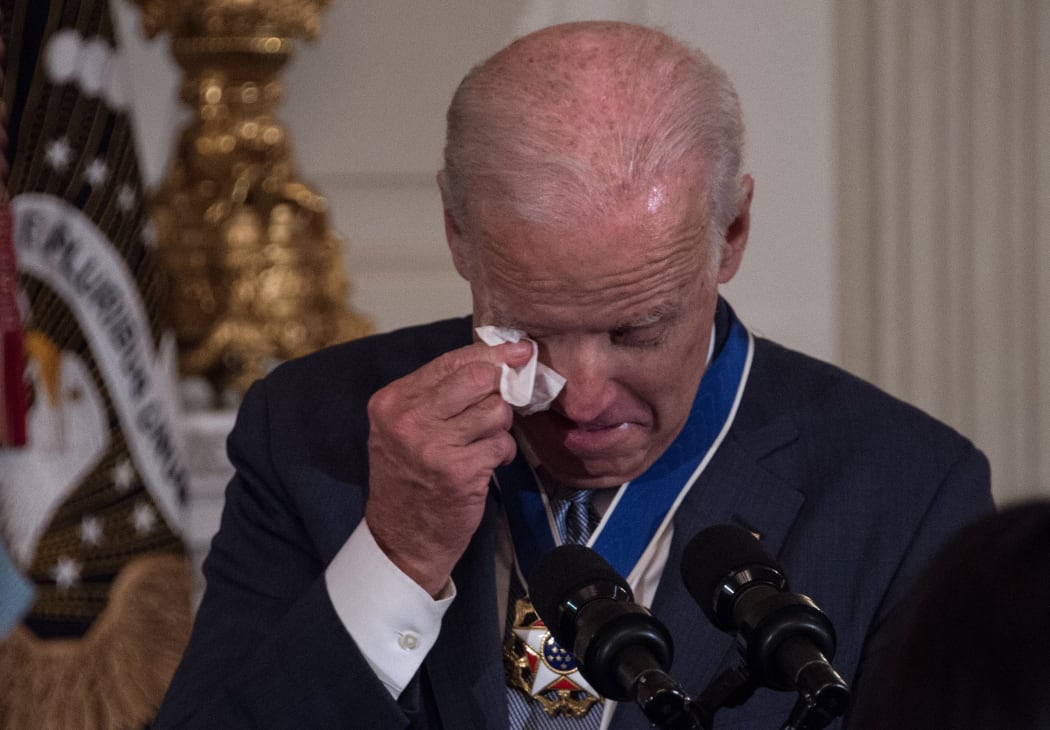 US Vice-President Joe Biden wipes away tears after being awarded the Presidential Medal of Freedom.