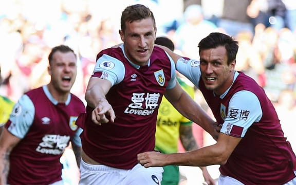 All Whites striker Chris Wood (centre) was part of Burnley first win over Liverpool in more than 40 years.