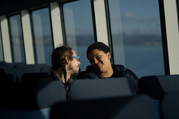 couple talking on a bus