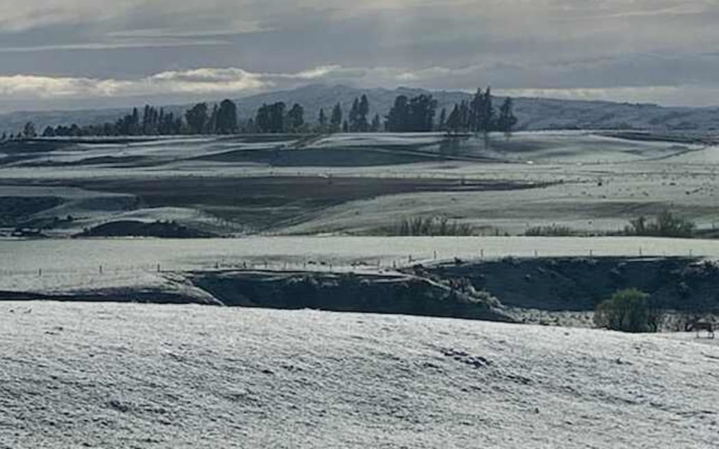 Farmland covered in snow at Matakanui Station, Omakau, Central Otago.