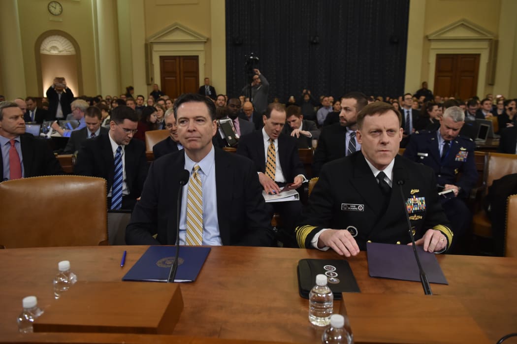 FBI director James Comey, left,  and National Security Agency director Mike Rogers at the Intelligence Committee hearing.