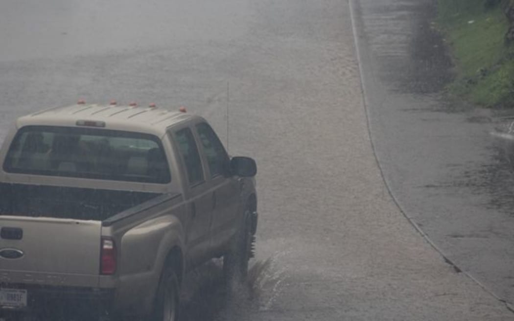 Heavy rain starts in American Samoa as Tropical Cyclone Amos approaches.