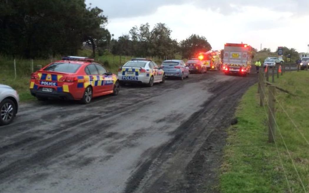 Four people have died in a crash at Muriwai beach.
