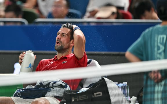 Serbia's Novak Djokovic gestures during his men's singles match against Spain's Jaume Munar at the Shanghai Masters tennis tournament in Shanghai on October 7, 2025. (Photo by HECTOR RETAMAL / AFP)