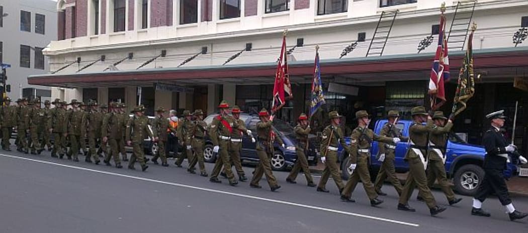 Troops in WW! uniform march during commemorations in Dunedin