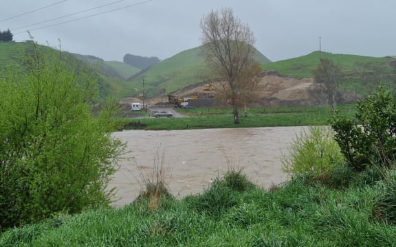 Mataura River, as seen from River Street in Gore, flows swiftly as heavy rain batters the region on 21 September, 2023.