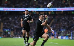 Will Jordan of New Zealand celebrates after scoring against England at Twickenham 2024.