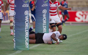 Fiji Warriors fly-half Jonetani Ralulu scores a try in their 39-16 win over Junior Japan.