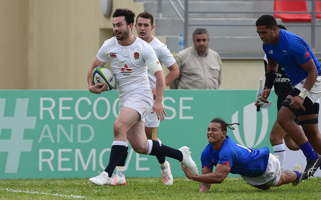 England's Dominic Morris breaks clear to score his second try against Samoa.