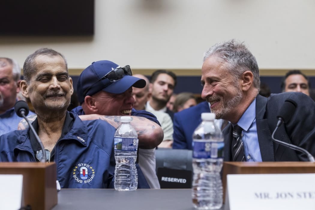 Jon Stewart (right), Luis Alvarez and John Feal (centre) speak at the House Judiciary Committee hearing on the Sept 11 Victims' Fund.