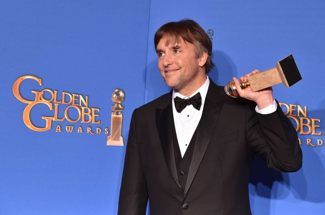 Director Richard Linklater, winner of Best Director for 'Boyhood,' poses in the press room during the 72nd Annual Golden Globe Awards.