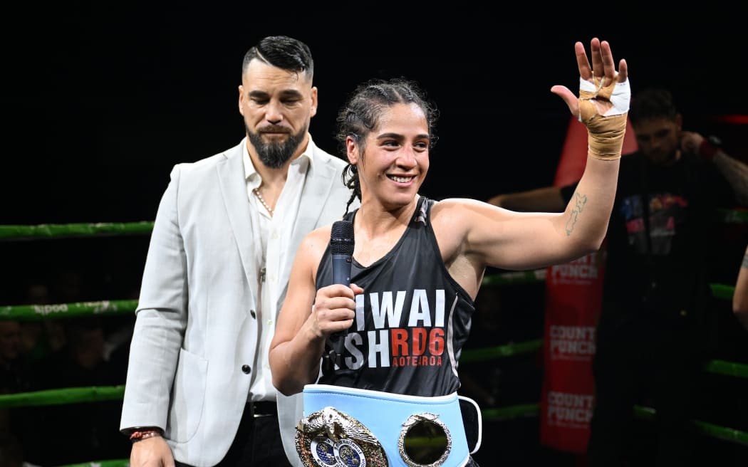 IBF Heavyweight World Title Champion Lani Daniels celebrates at Eventfinda Stadium in Auckland.