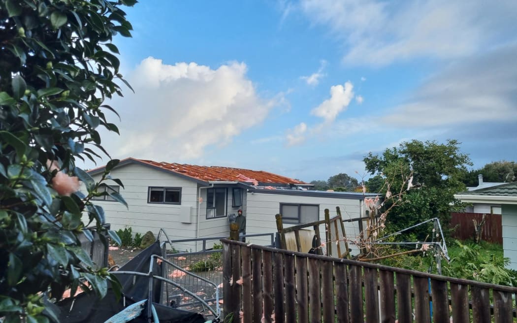 A house on Aorangi Road, Paraparaumu, had its roof lifted off by the ornado that swept through early Tuesday morning.