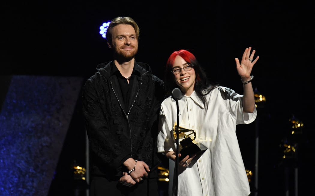 (From L) Finneas O'Connell and US singer songwriter Billie Eilish accept the award for best Song Written for Visual Media for "What Was I Made For?" during the 66th Annual Grammy Awards pre-telecast show at the Crypto.com Arena in Los Angeles on February 4, 2024. (Photo by VALERIE MACON / AFP)